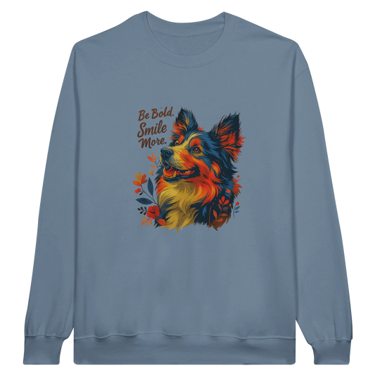 Front view — light blue sweatshirt with colorful dog illustration and text “Be Bold, Stay Wild.”