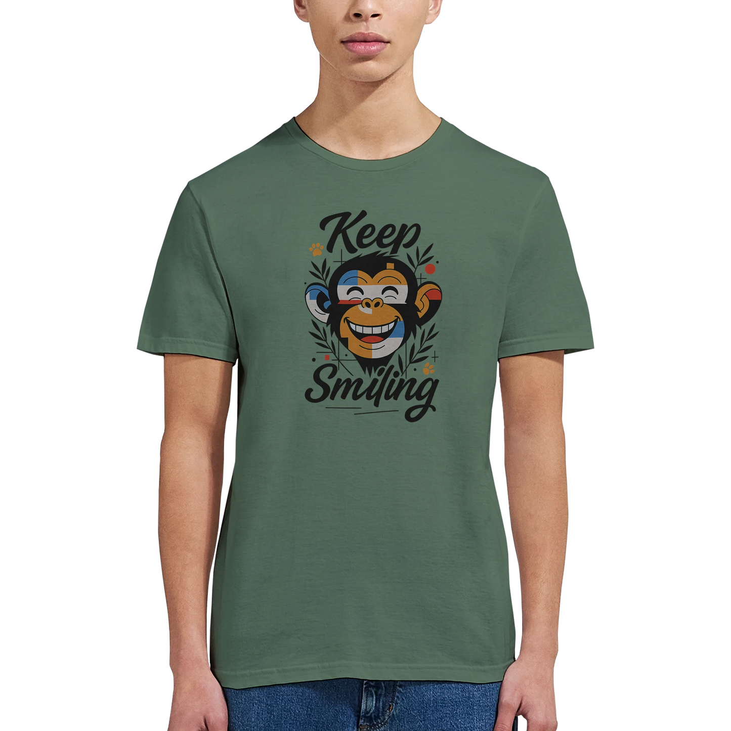 Male model wearing green T-shirt — front view; smiling monkey graphic with Keep Smiling text.