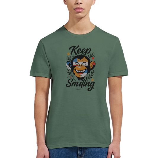 Male model wearing green T-shirt — front view; smiling monkey graphic with Keep Smiling text.