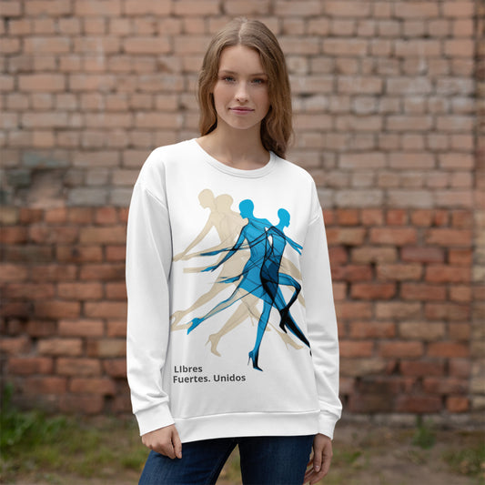 Female model wearing white sweatshirt — front print: abstract overlapping human figures in blue and beige with text Libres Fuertes Unidos