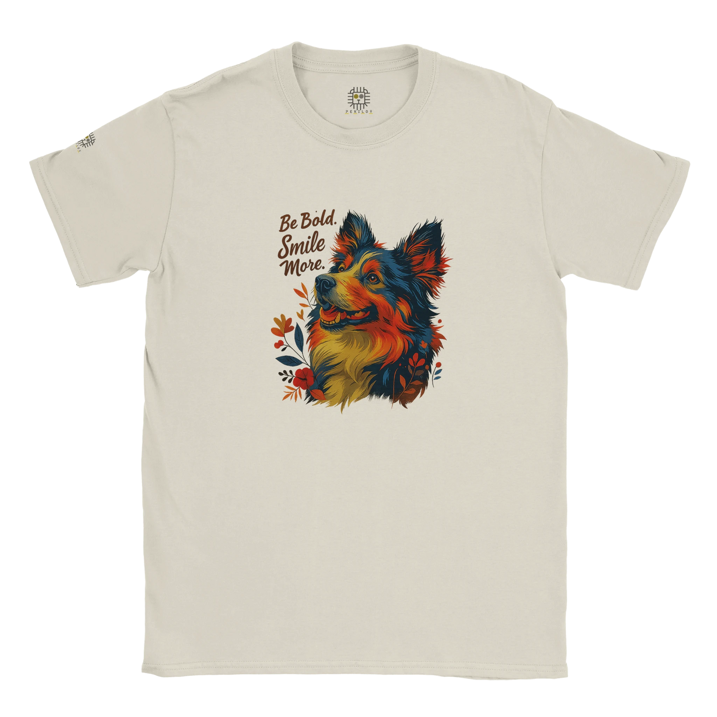 Beige T-shirt – Beige unisex graphic tee with colorful artistic dog illustration, floral accents, and motivational quote “Be Bold, Smile More.” Perfect inspirational T-shirt for dog lovers.
