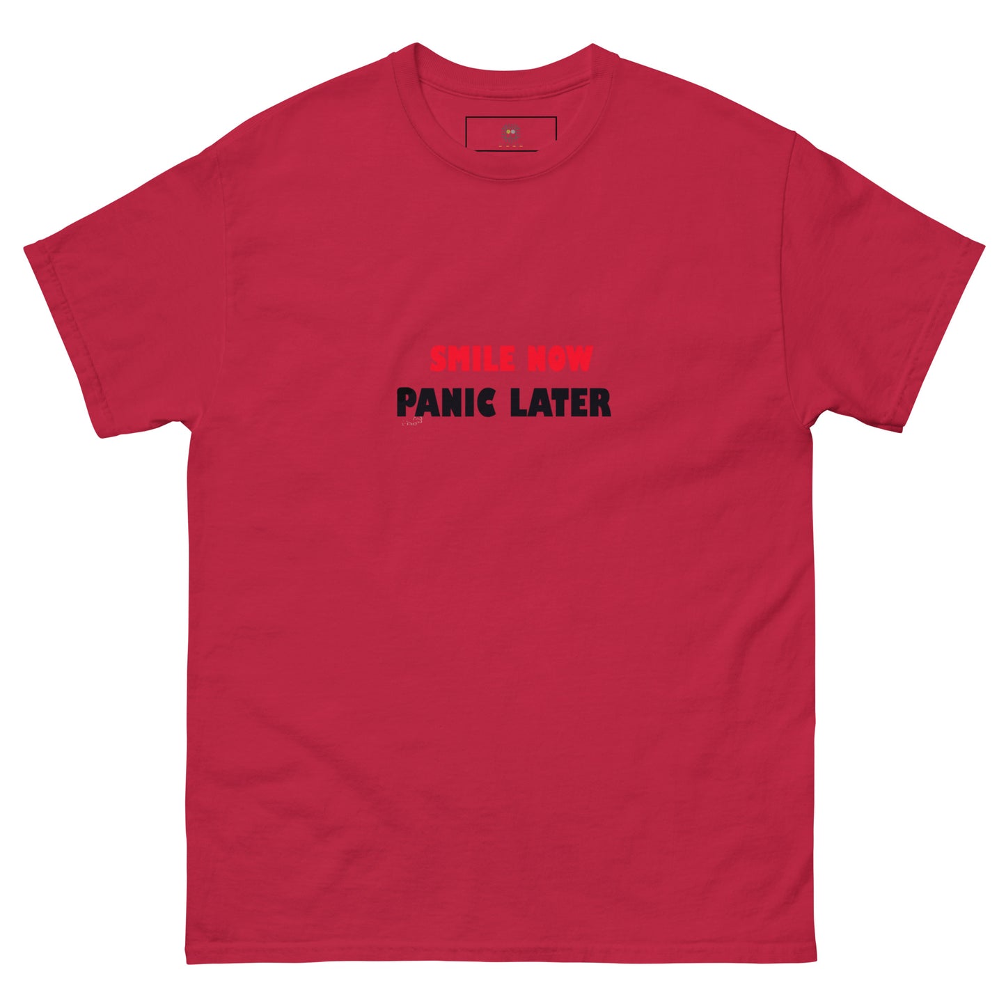 Red T-shirt with large multicolor abstract face design on the front. Artistic streetwear for bold personalities
