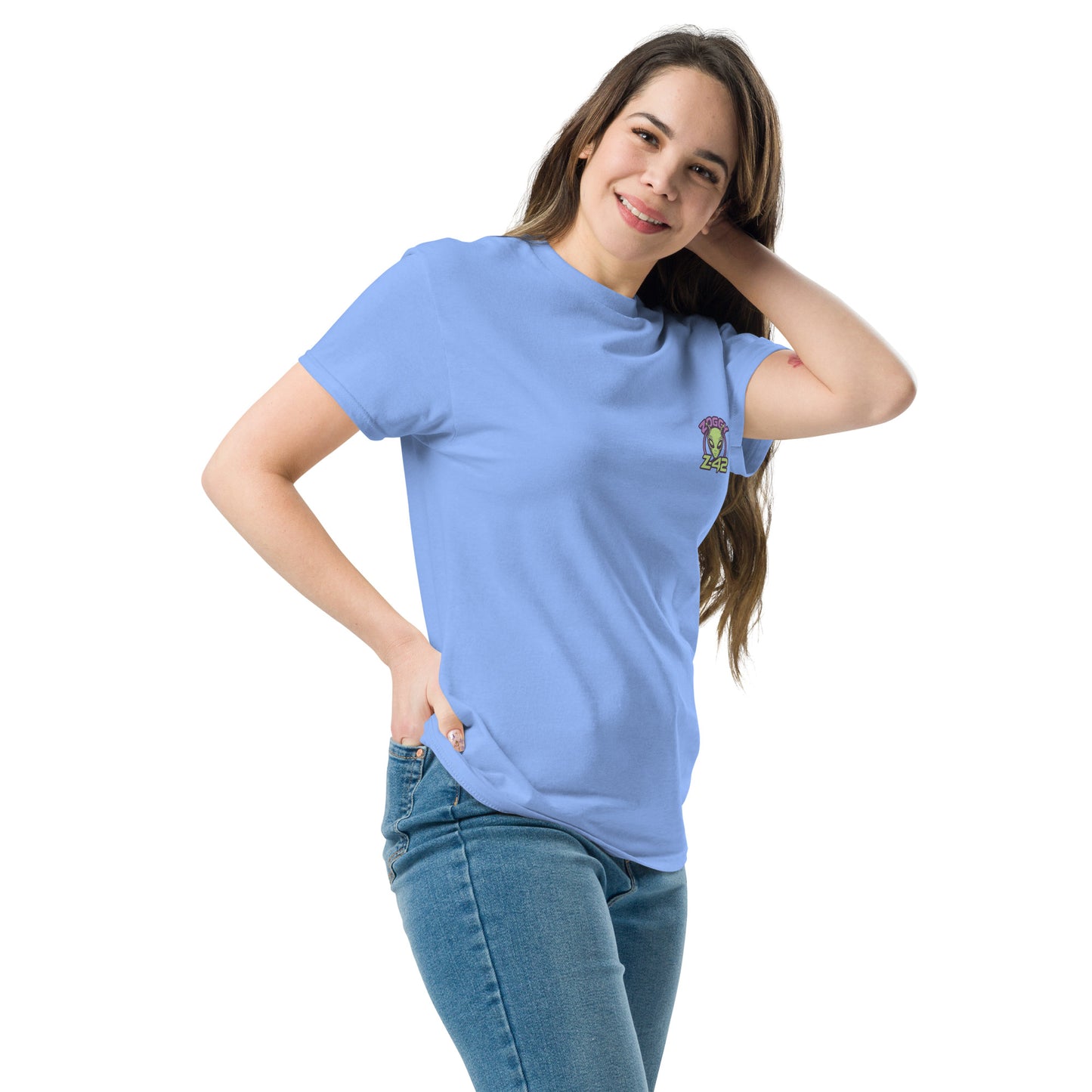 Female model wearing light blue T-shirt — front left chest small alien head graphic