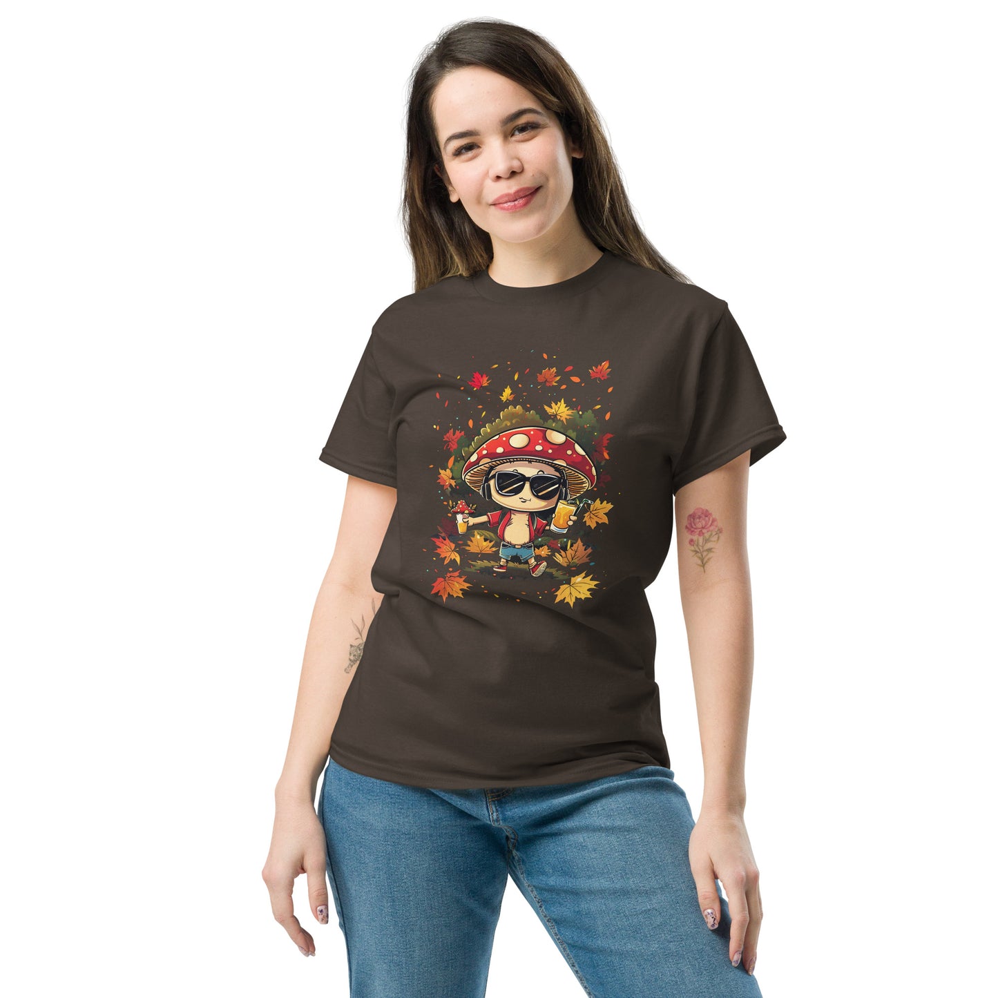 Dark brown T-shirt on a female model, showing the mushroom surrounded by falling leaves.
