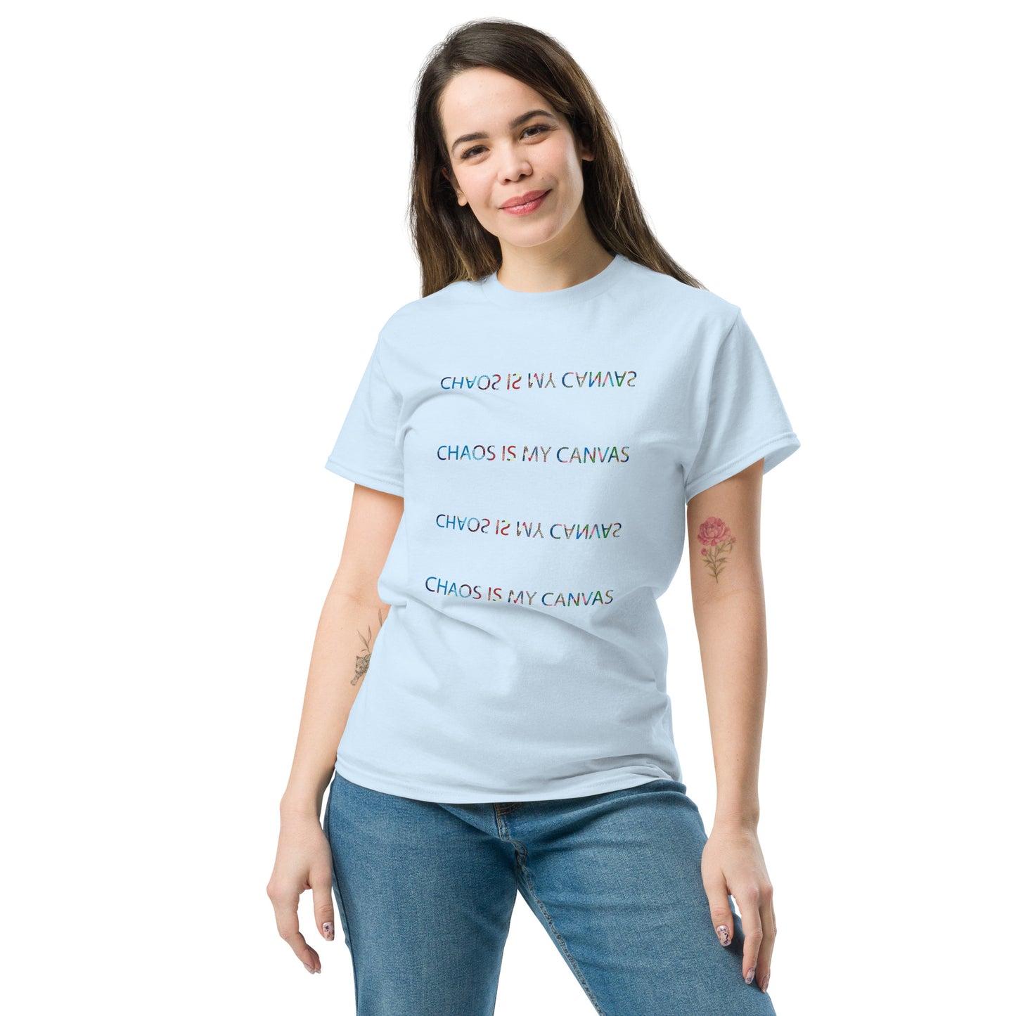 Light blue unisex T-shirt – Chaos Is the Courtesy text, front view on female model.