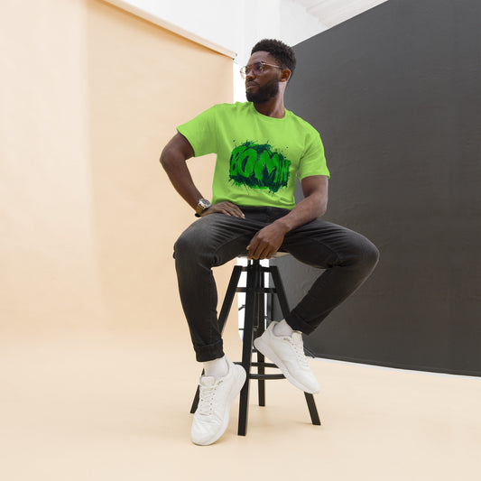 Man wearing neon green BOOMIN t-shirt with acid green graffiti glitch print, urban streetwear style.