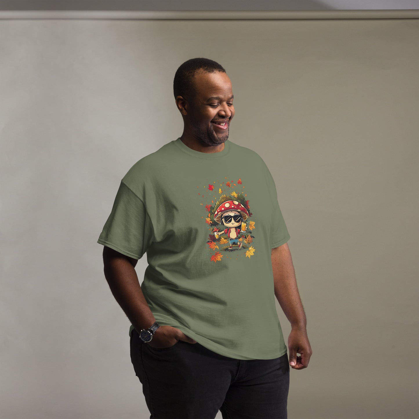 Green T-shirt on a male model, showcasing the autumn mushroom print.