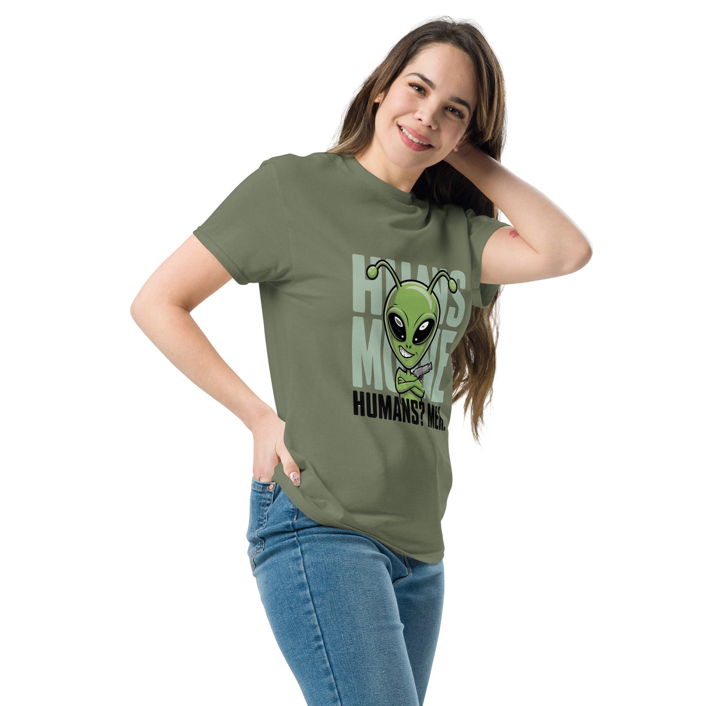 Female model wearing olive green T-shirt — front print: green alien face above text HOW’S MY MOOD? HUMANS? MEH.