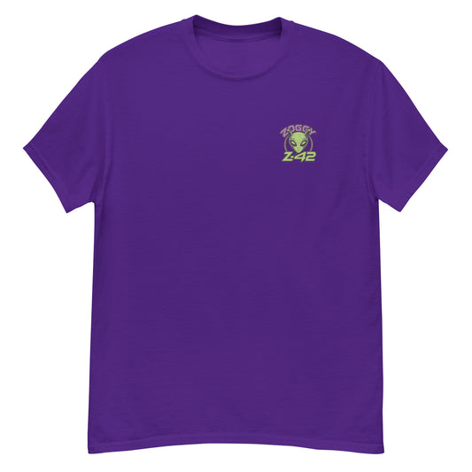 Purple unisex T-shirt — front left chest small alien head graphic