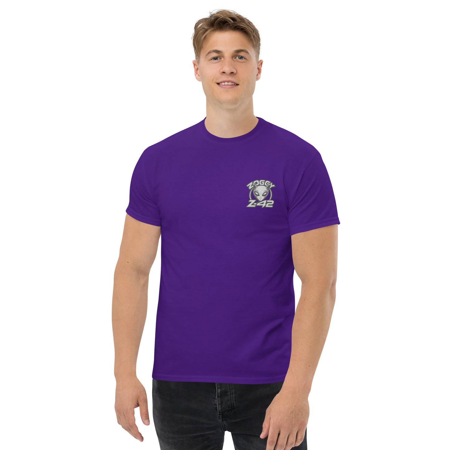 Male model wearing purple T-shirt — front left chest small grey alien head with text ZOGGY Z-42