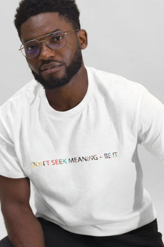 White unisex T-shirt – I Feel Normal rainbow text, front view on male model.