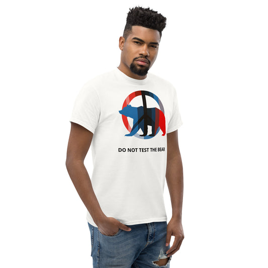 Model wearing a white graphic t-shirt with the “DO NOT TEST THE BEAR” statement.
The centered front print remains dominant while the clean silhouette keeps the message direct and uncompromised.
