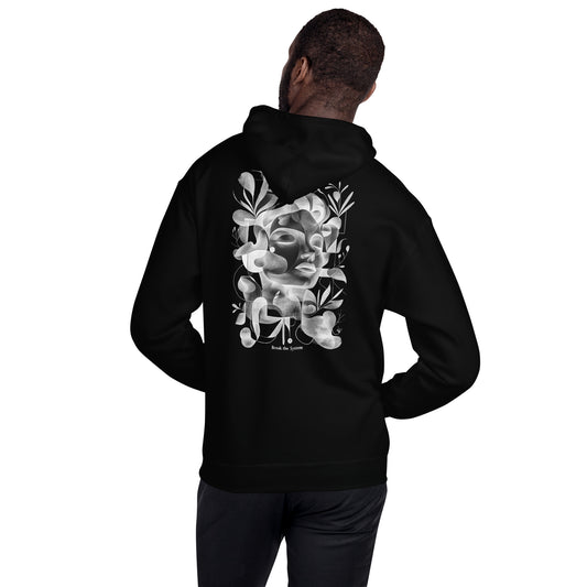 Man wearing black hoodie with monochrome abstract art print on the back