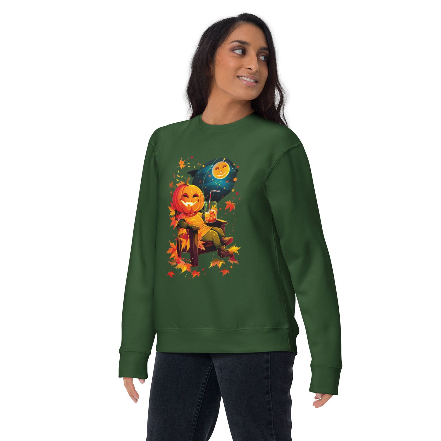 Woman wearing green sweatshirt with pumpkin throne Halloween print.