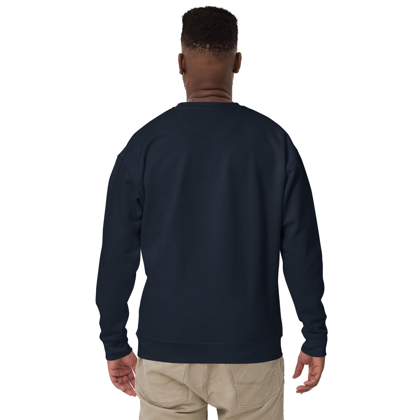 Man from the back wearing navy sweatshirt with ghost and autumn butterflies Halloween design.