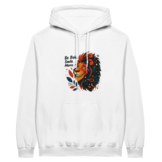 White hoodie with a bold lion illustration in rich orange and black tones, paired with the uplifting phrase “Be Bold, Smile More,” giving a confident streetwear look.