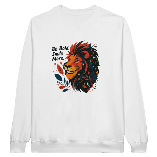 White crewneck sweatshirt featuring a powerful lion illustration surrounded by colorful details, paired with the inspiring phrase “Be Bold, Smile More.” Perfect for those who love statement streetwear.