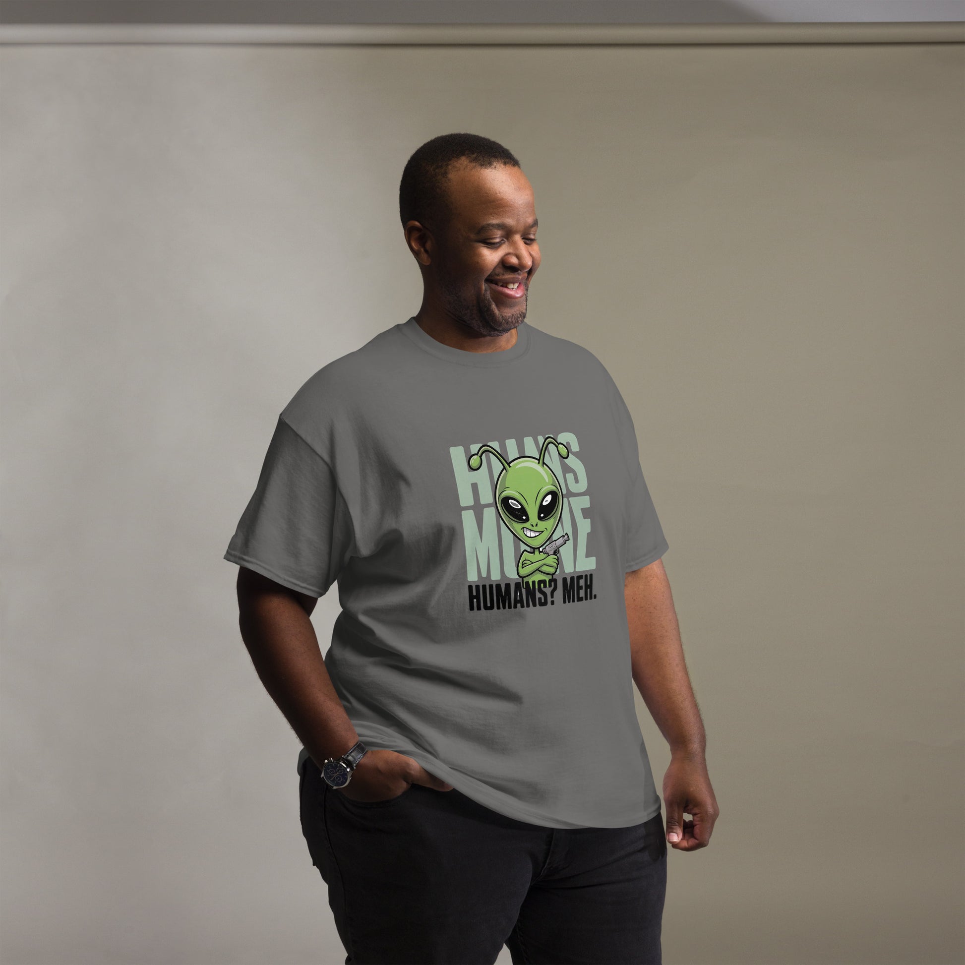 Male model wearing blue T-shirt — front print: green alien face above text HOW’S MY MOOD? HUMANS? MEH.