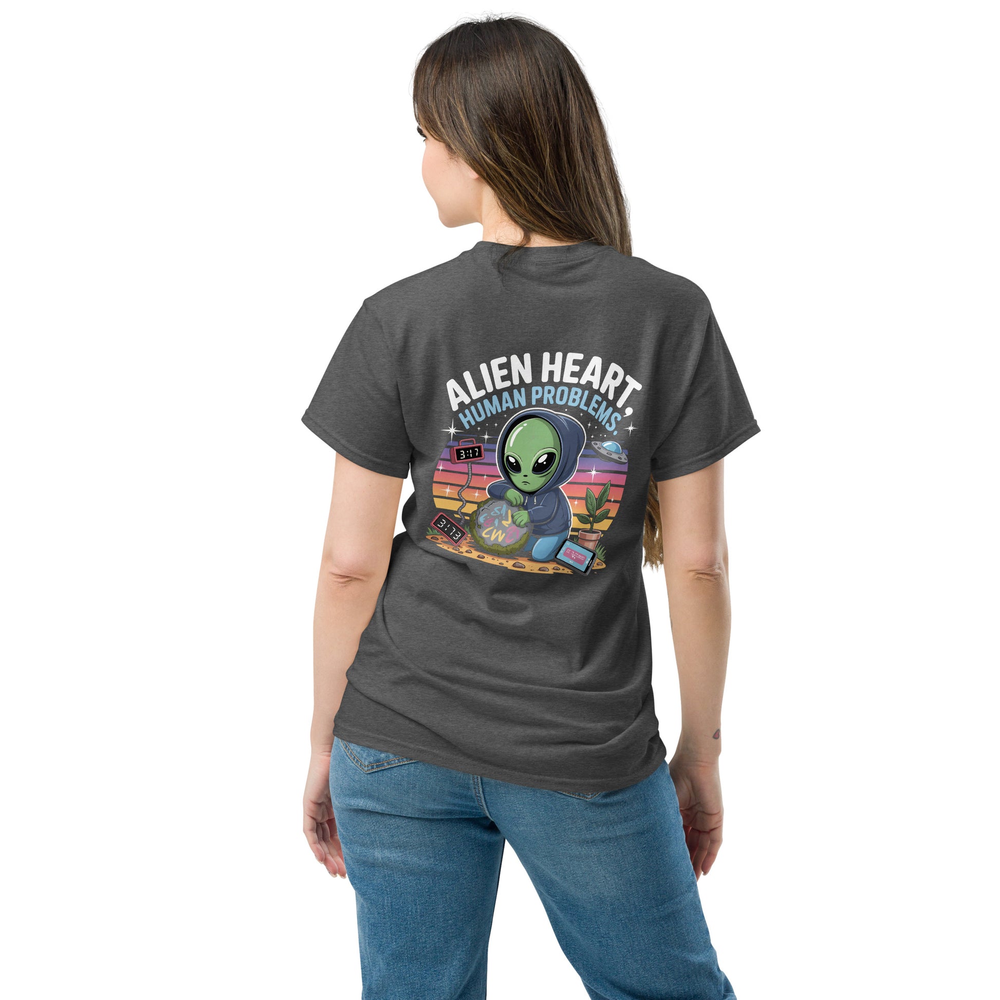 Female model wearing grey T-shirt — back print: green alien in floral frame with text ALIEN HEART