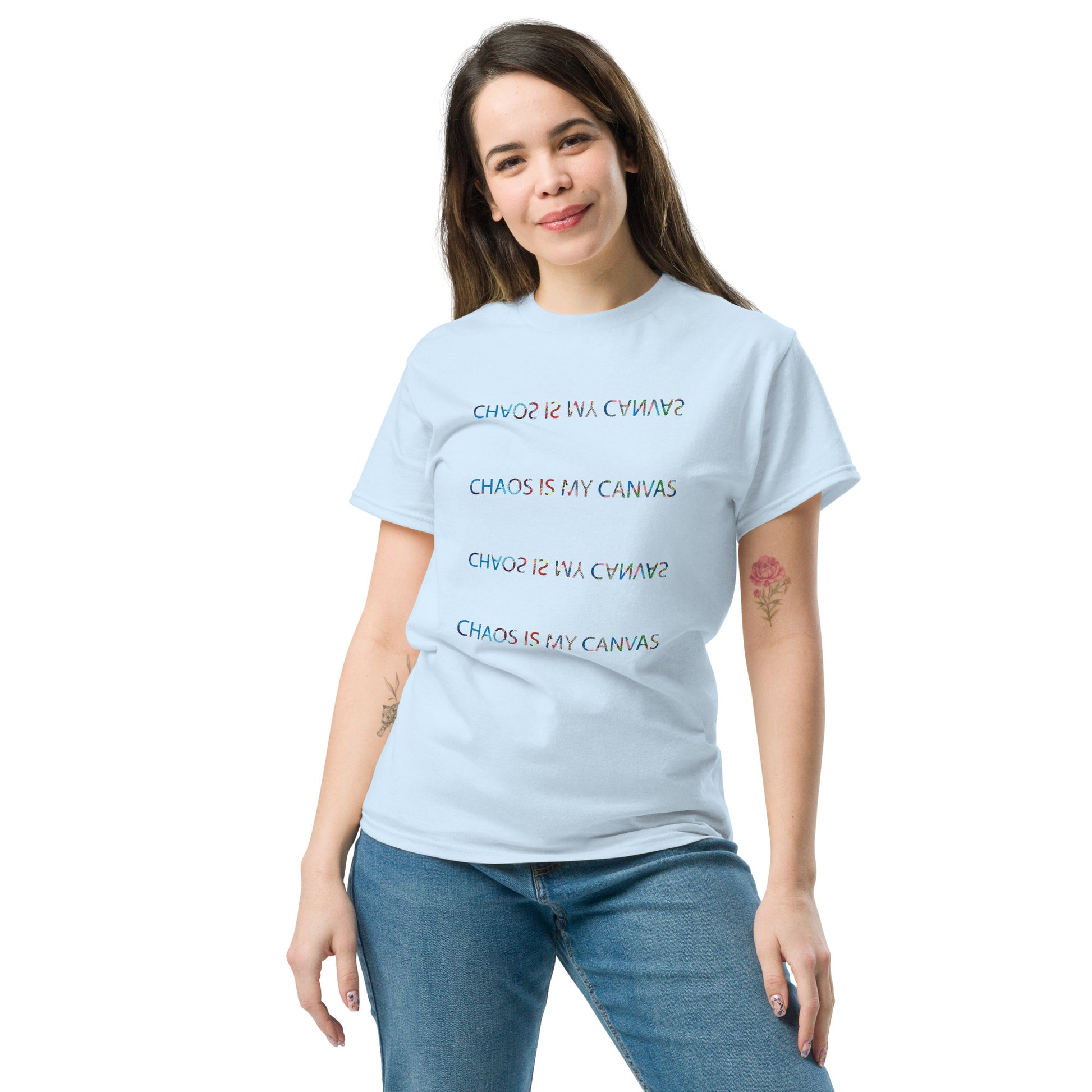 Light blue unisex T-shirt – Chaos Is the Courtesy text, front view on female model.