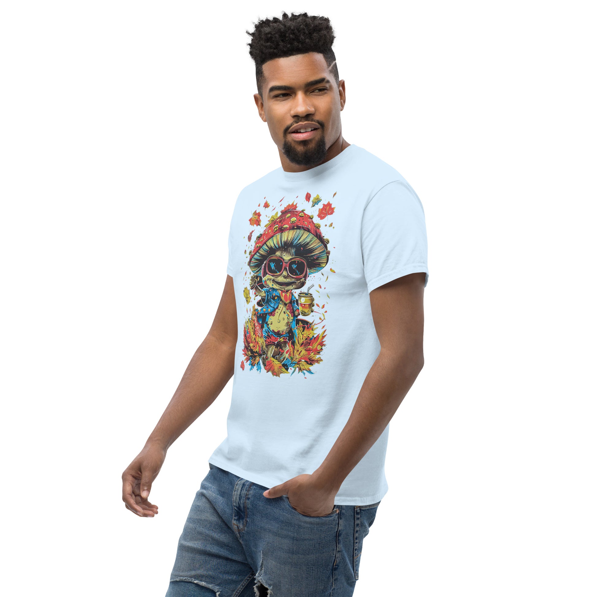 A male model in a white T-shirt with the mushroom character print, posing with hands in pockets.
