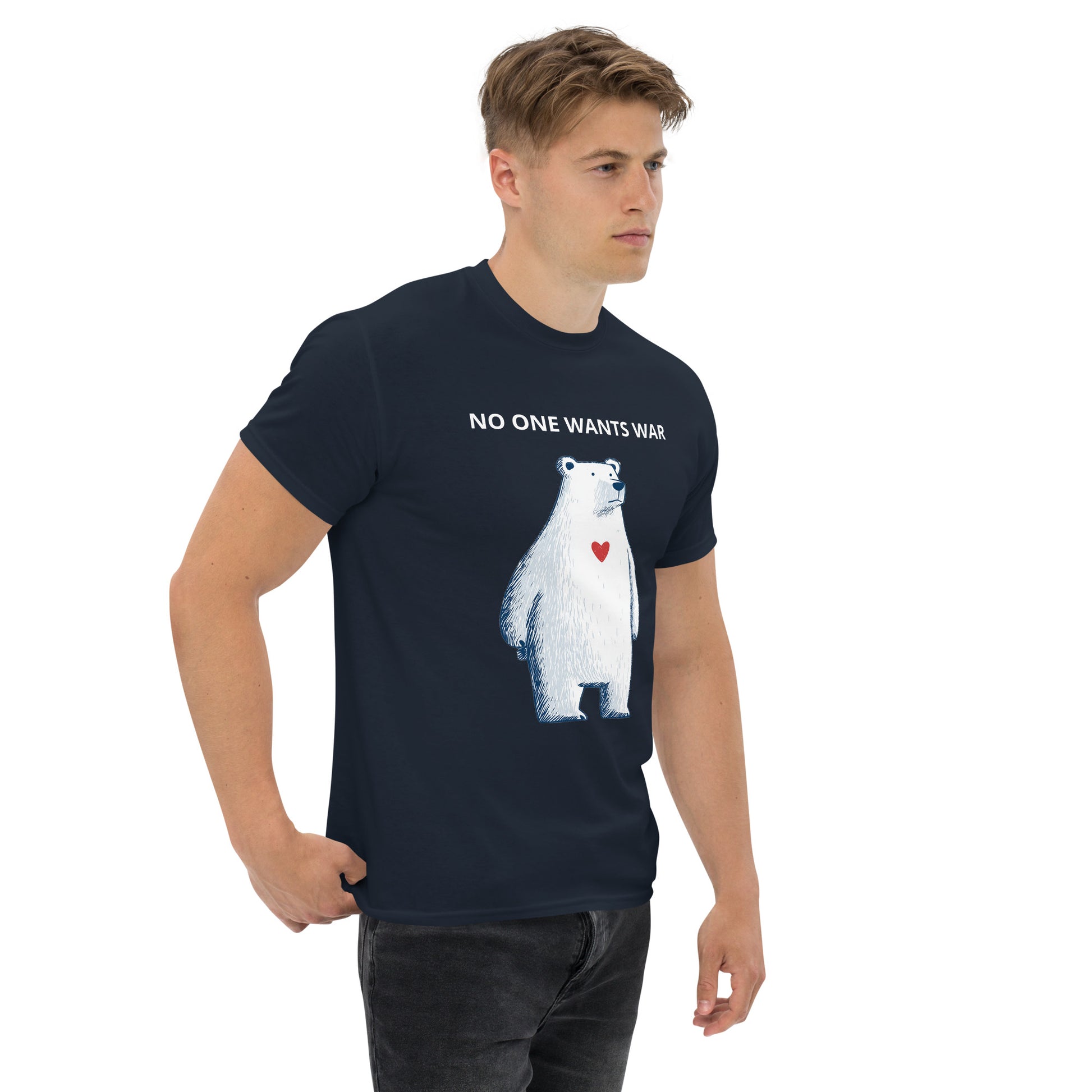 Model wearing a black graphic t-shirt with the “NO ONE WANTS WAR” statement.
The front print remains clearly readable while maintaining a balanced, understated presence within the overall silhouette.