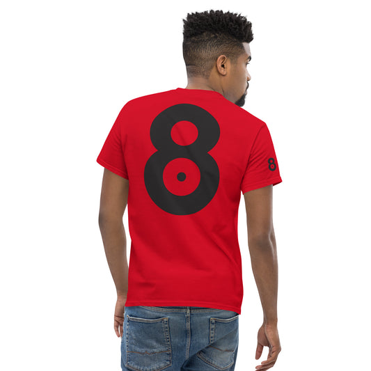 Back view of the t-shirt worn by a model, showing how the eight-shaped graphic aligns with the body and remains clearly readable in a natural standing position.