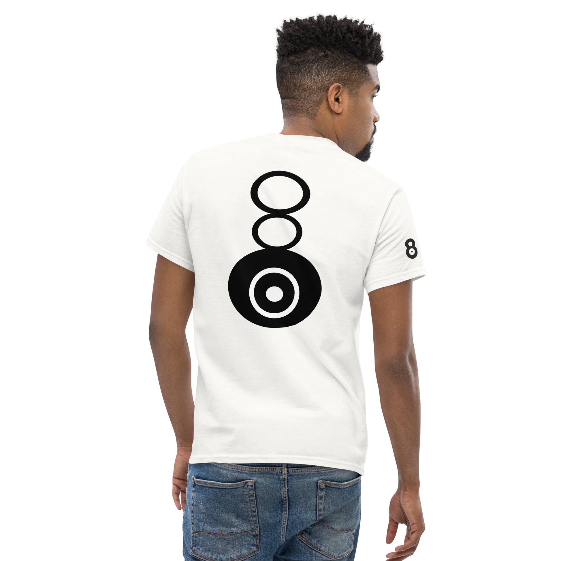 Back view of the t-shirt worn by a model, showing how the vertical eight graphic aligns naturally with the spine and remains clearly readable in a relaxed stance.