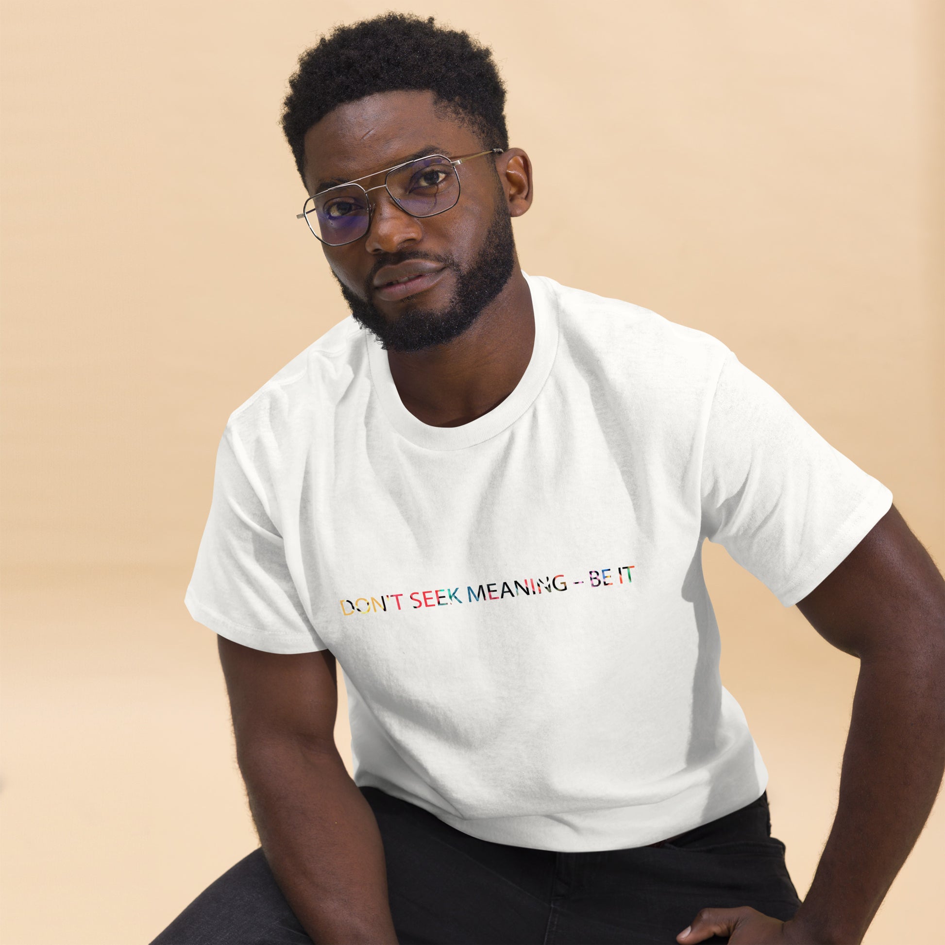 White unisex T-shirt – I Feel Normal rainbow text, front view on male model.