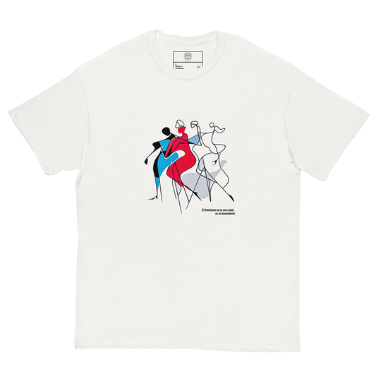 White unisex T-shirt — flat lay, front print: abstract female silhouettes in red, blue, black with text El feminismo no es una moda, es un movimiento.