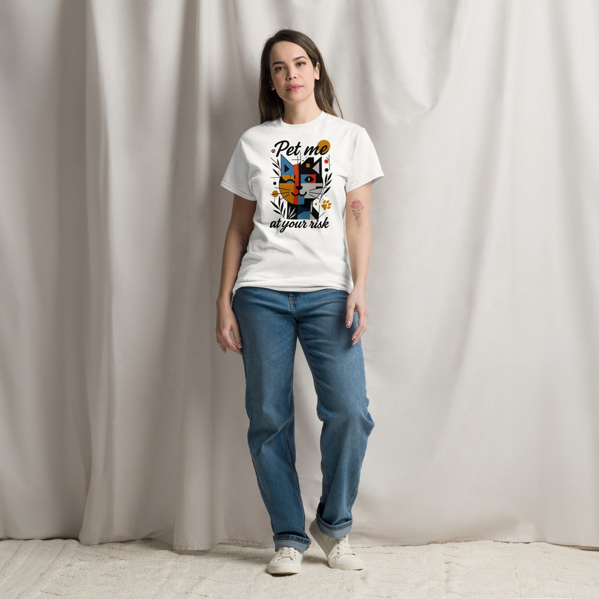 woman wearing white t shirt with geometric cat graphic pet me at your risk print front view