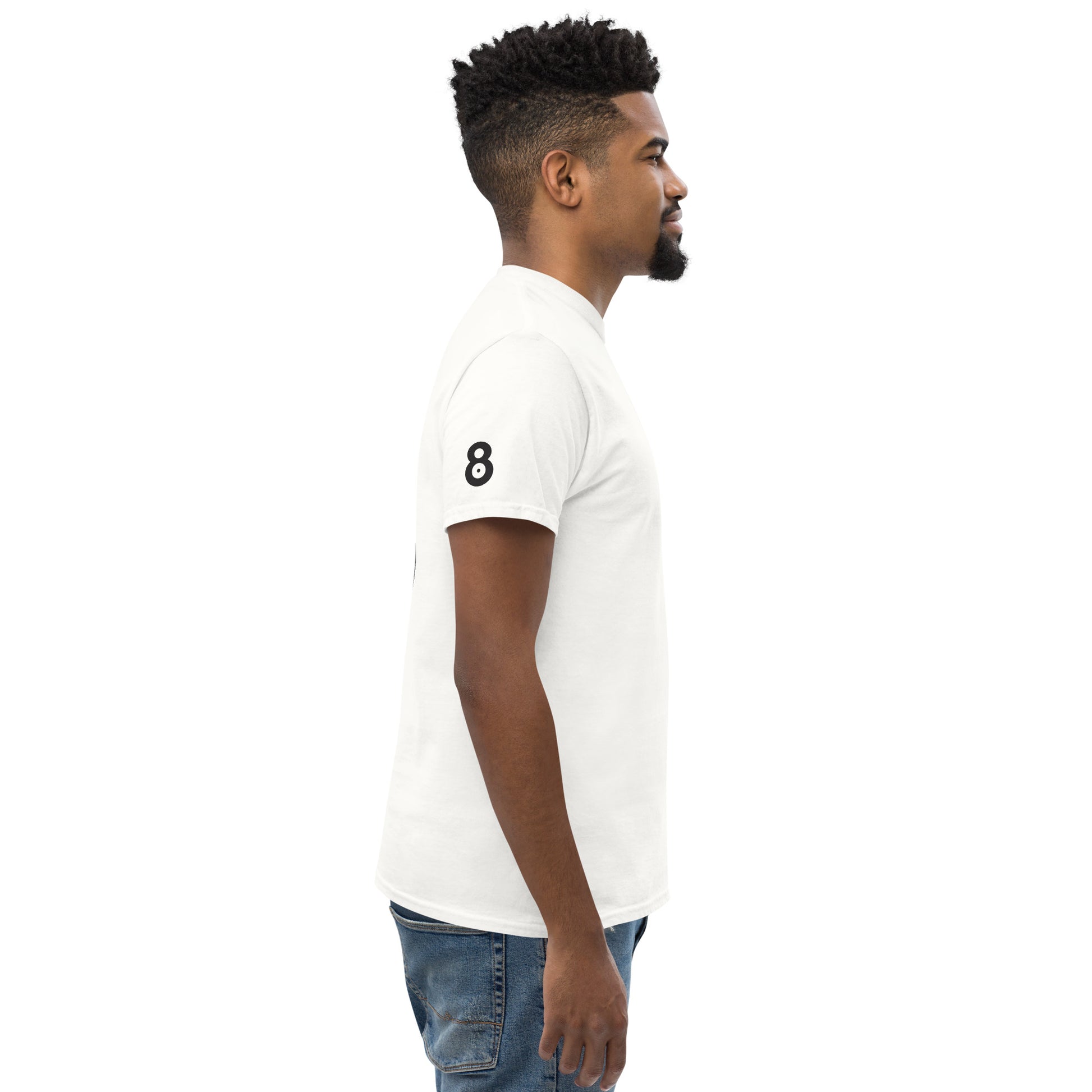 Side view of the t-shirt highlighting the clean silhouette and fabric drape. A small black eight mark is visible on the right sleeve as a secondary detail.