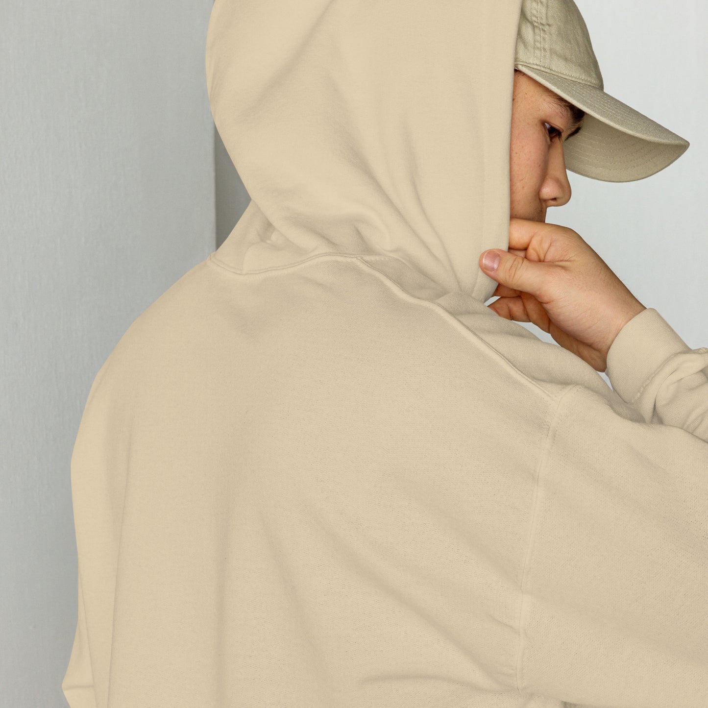 beige hoodie close up hood detail minimal streetwear style