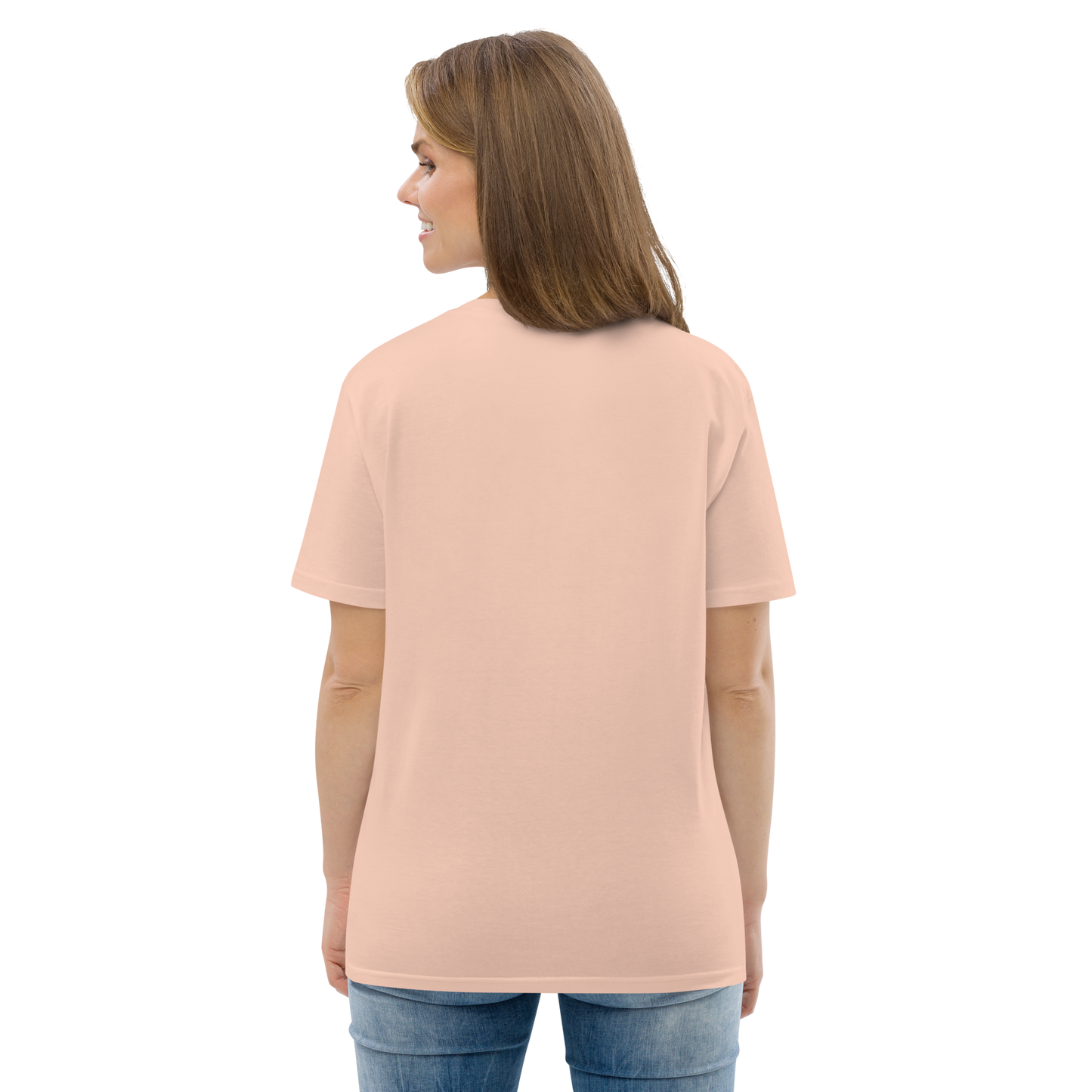 Female model wearing peach T-shirt — back view, blank