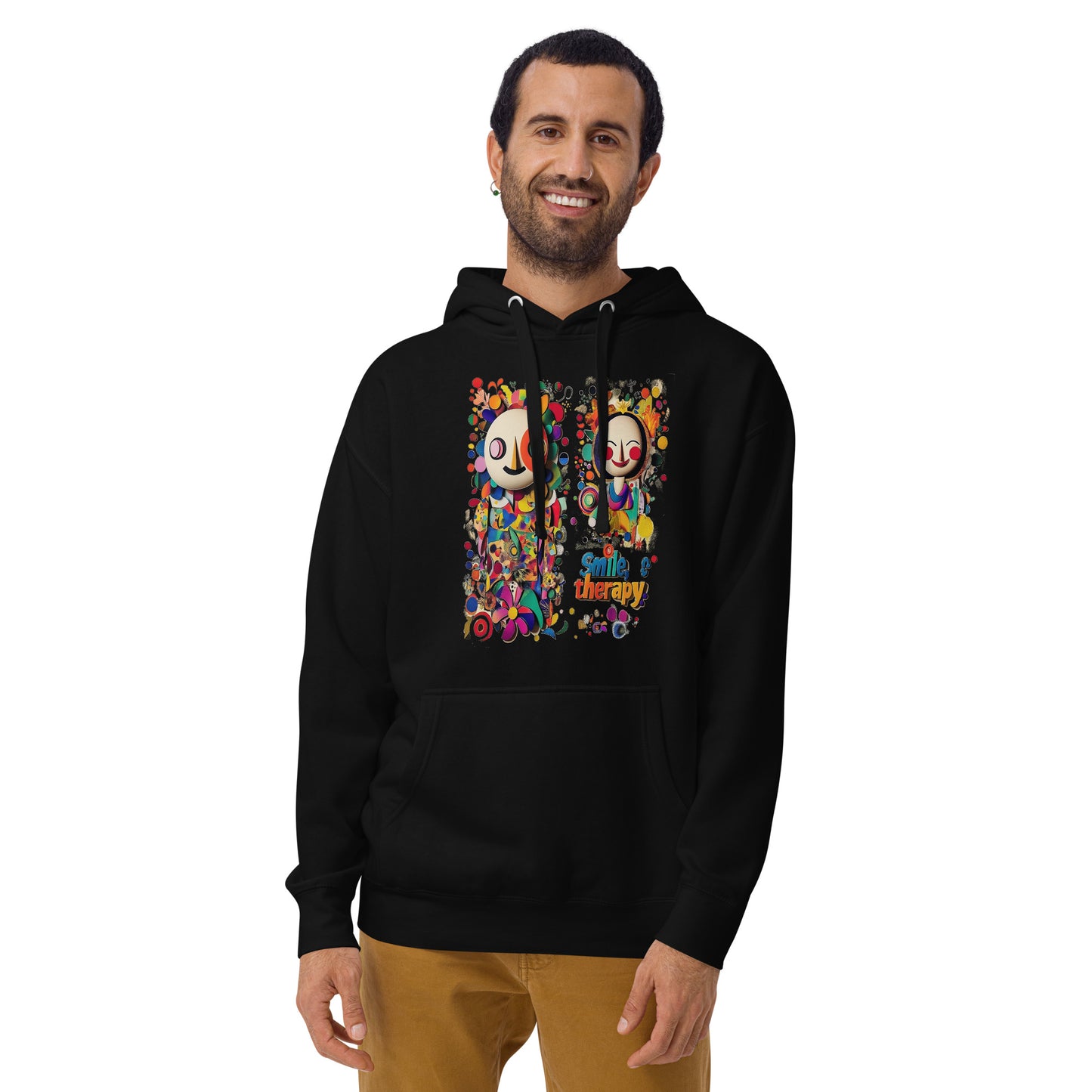 Man wearing a black unisex hoodie featuring a colorful Smile Therapy graphic with playful characters, vibrant abstract details, and artistic pop art elements from the Japan Pop Chaos collection.