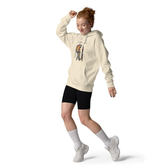 Person wearing a cream unisex hoodie with the Be a Rainbow illustration, showcasing a playful and energetic streetwear look.