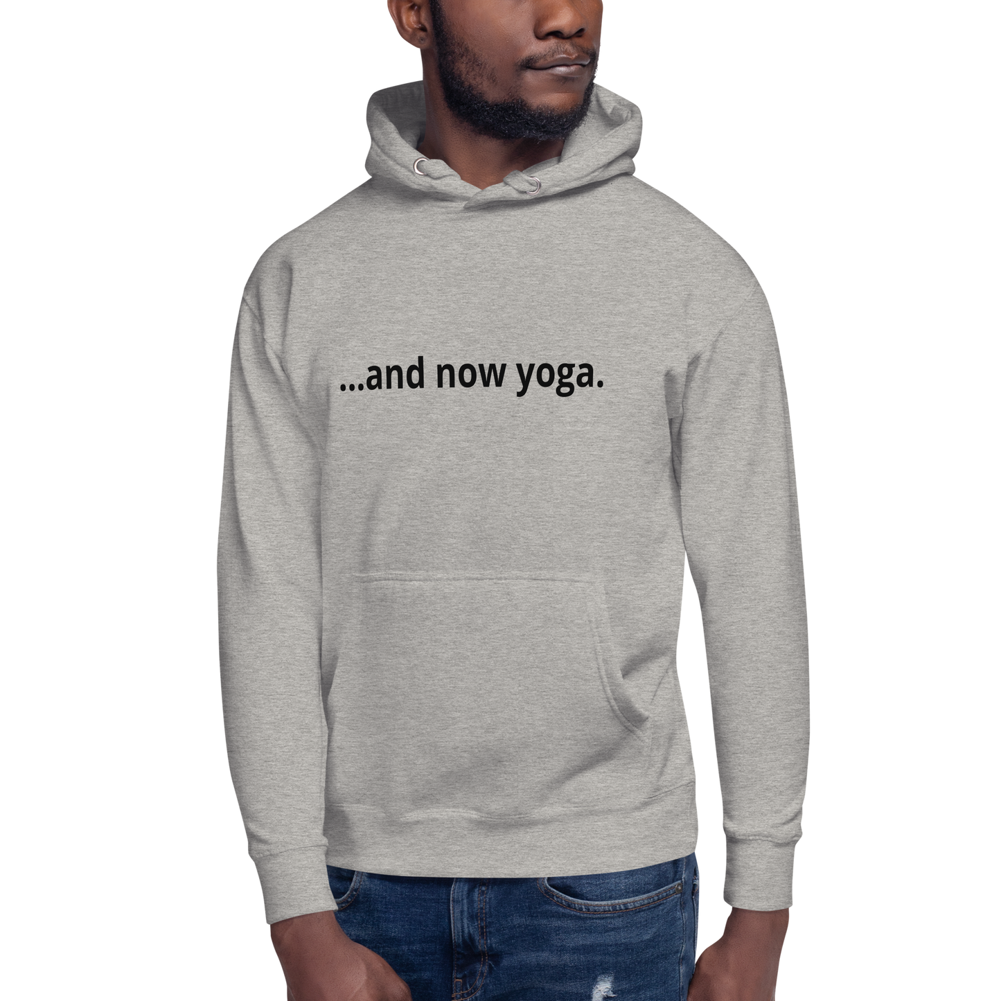 Close-up of a sand oversized hoodie featuring “…and now yoga.” minimalist typography