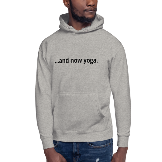 Close-up of a sand oversized hoodie featuring “…and now yoga.” minimalist typography