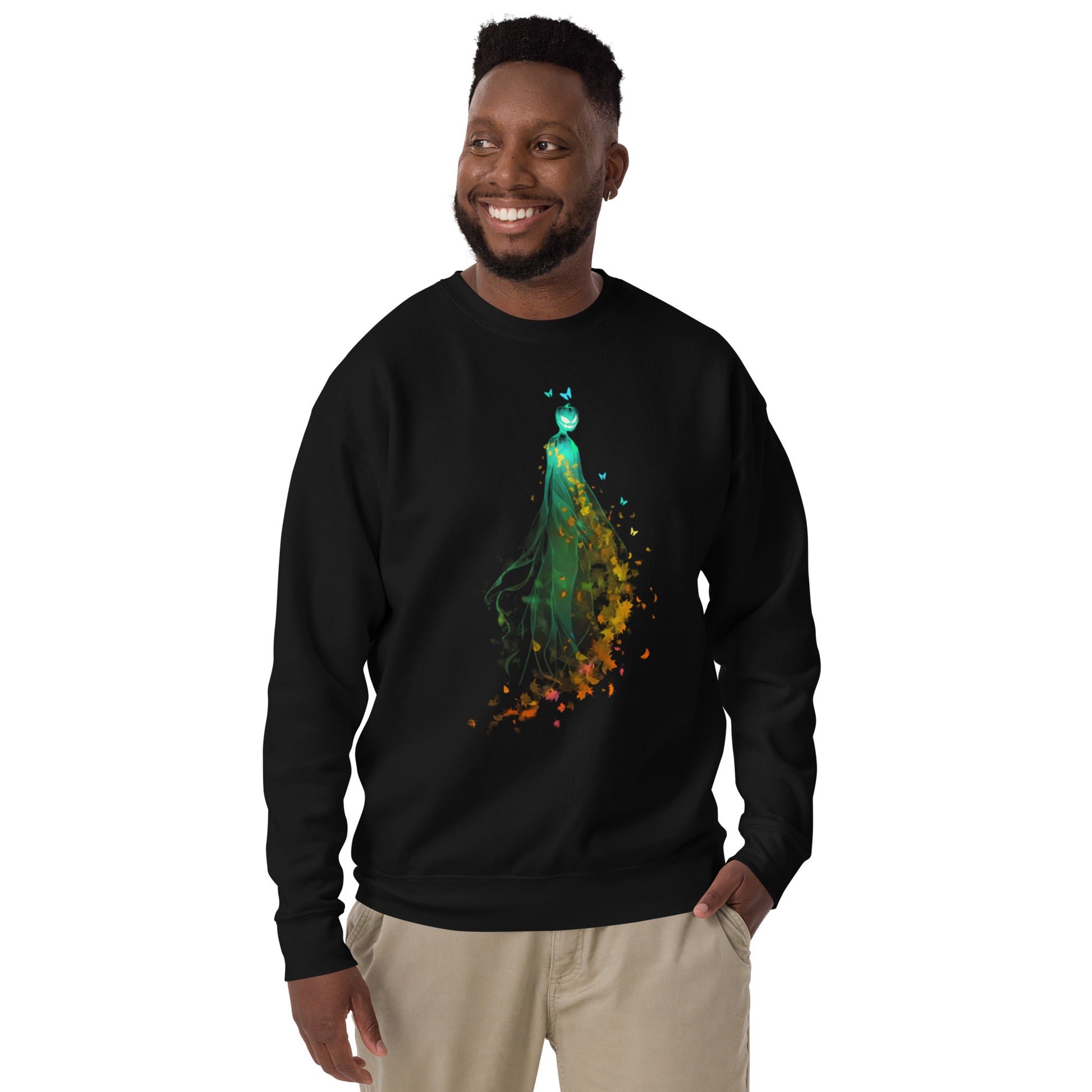 Man wearing black sweatshirt with pumpkin spirit and autumn leaves Halloween design.