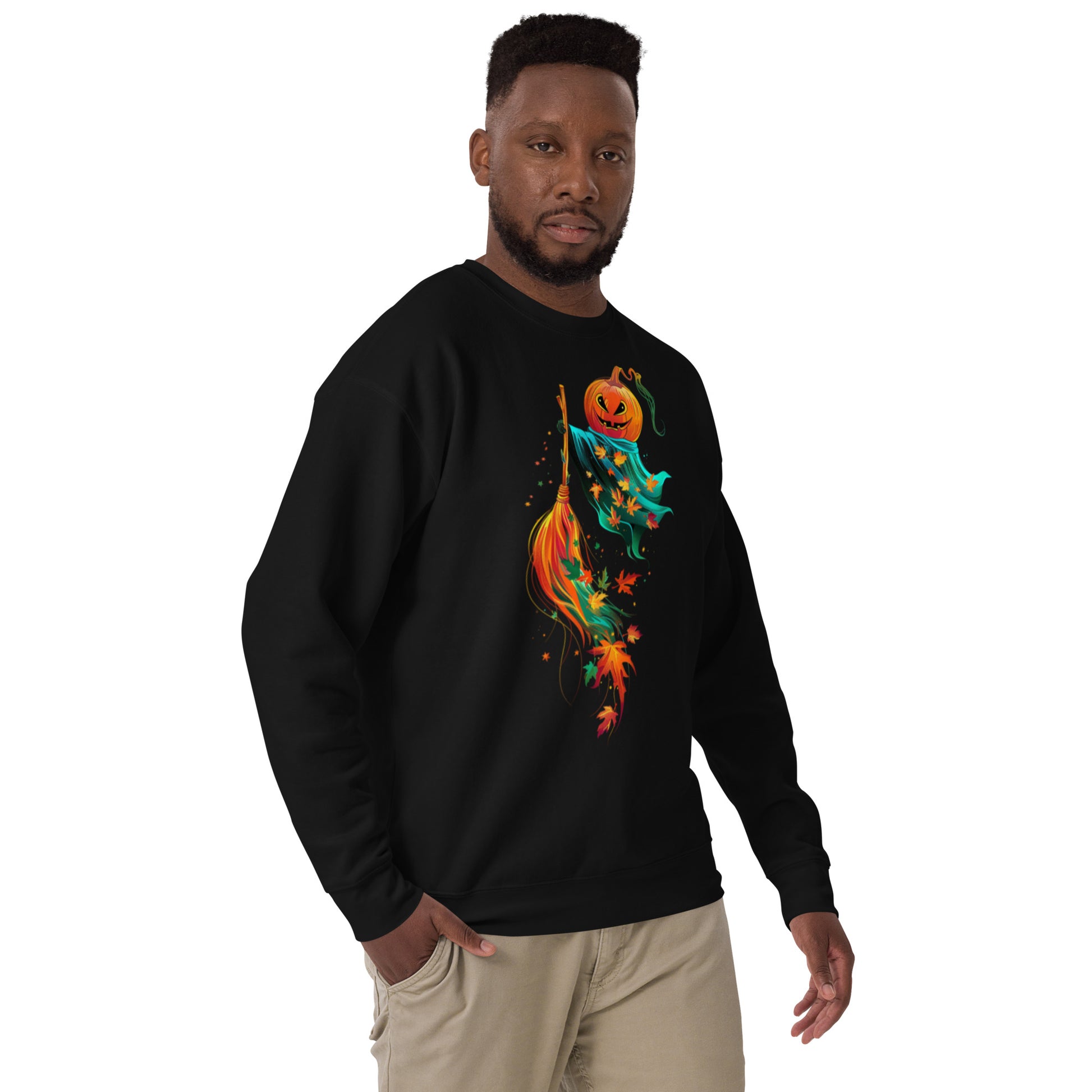 Man wearing black sweatshirt with pumpkin flying on broom Halloween design.