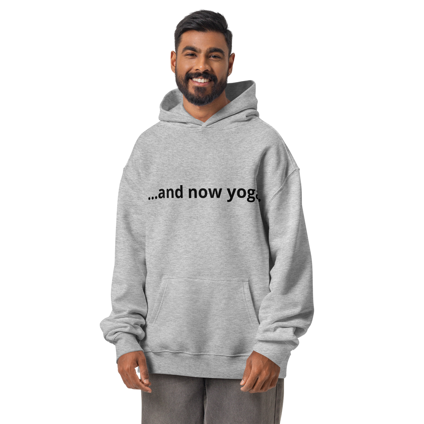 ProduFront view of a sport grey oversized hoodie with the minimalist phrase “…and now yoga.” printed on the chest.ct mockup