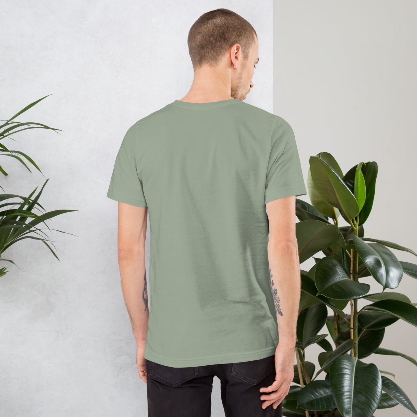 man wearing plain green t shirt back view minimal design