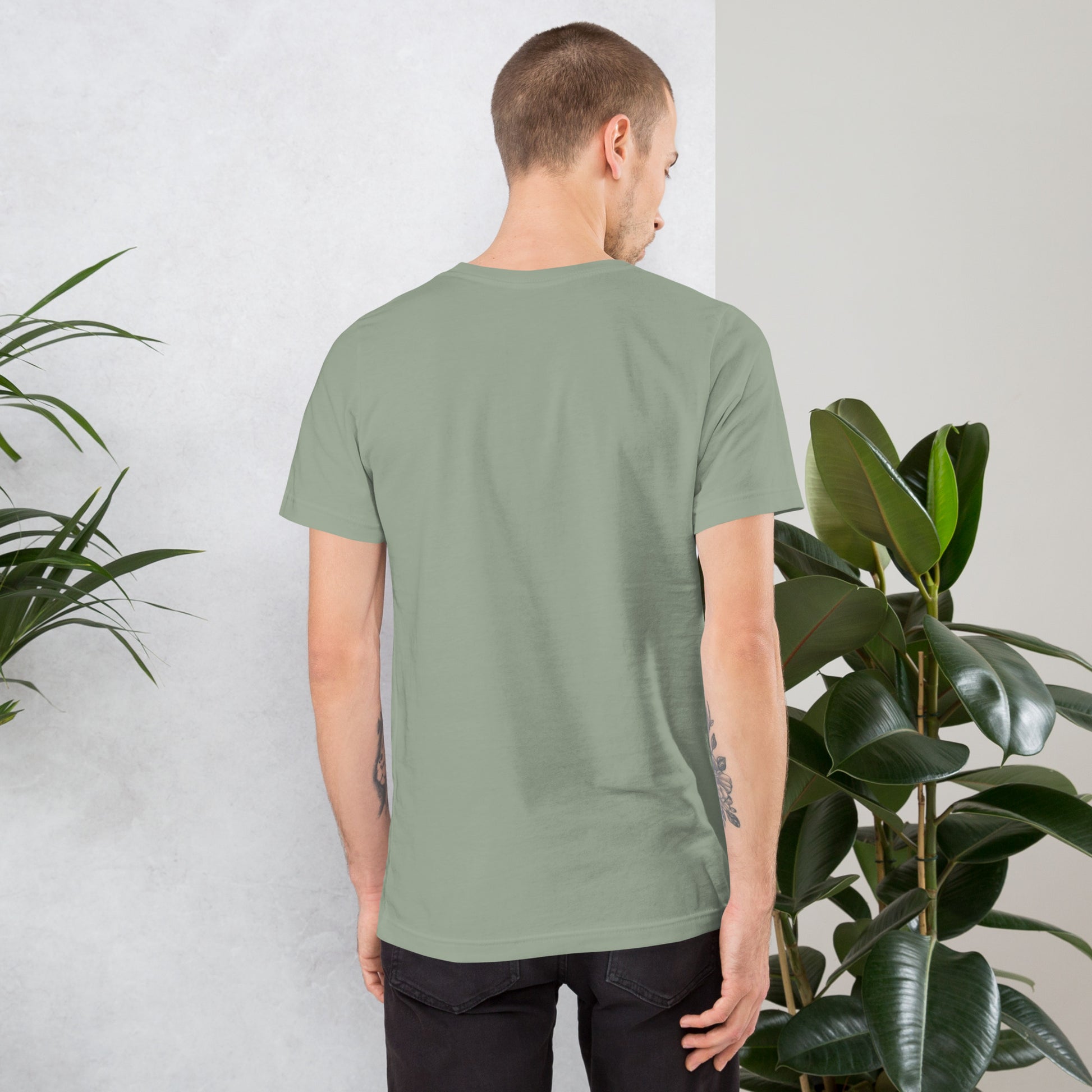man wearing plain green t shirt back view minimal design