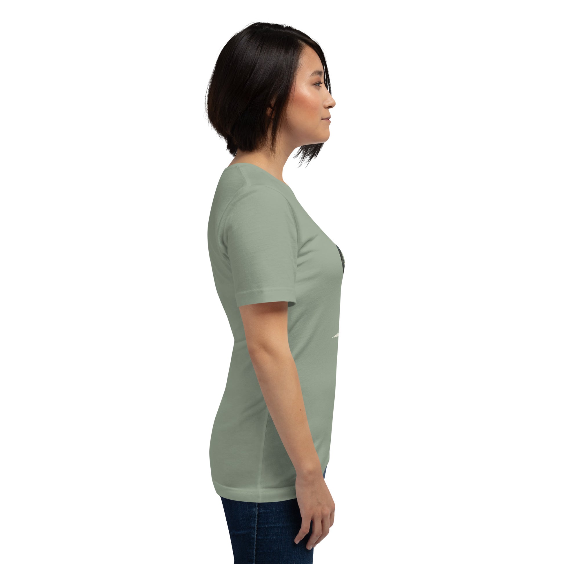 woman wearing green t shirt with abstract elephant graphic side view